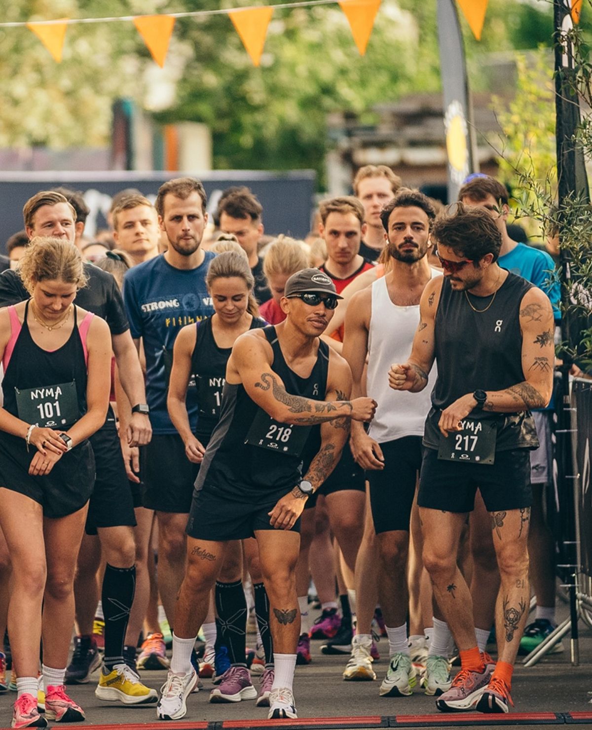 Runners gathering at a starting line